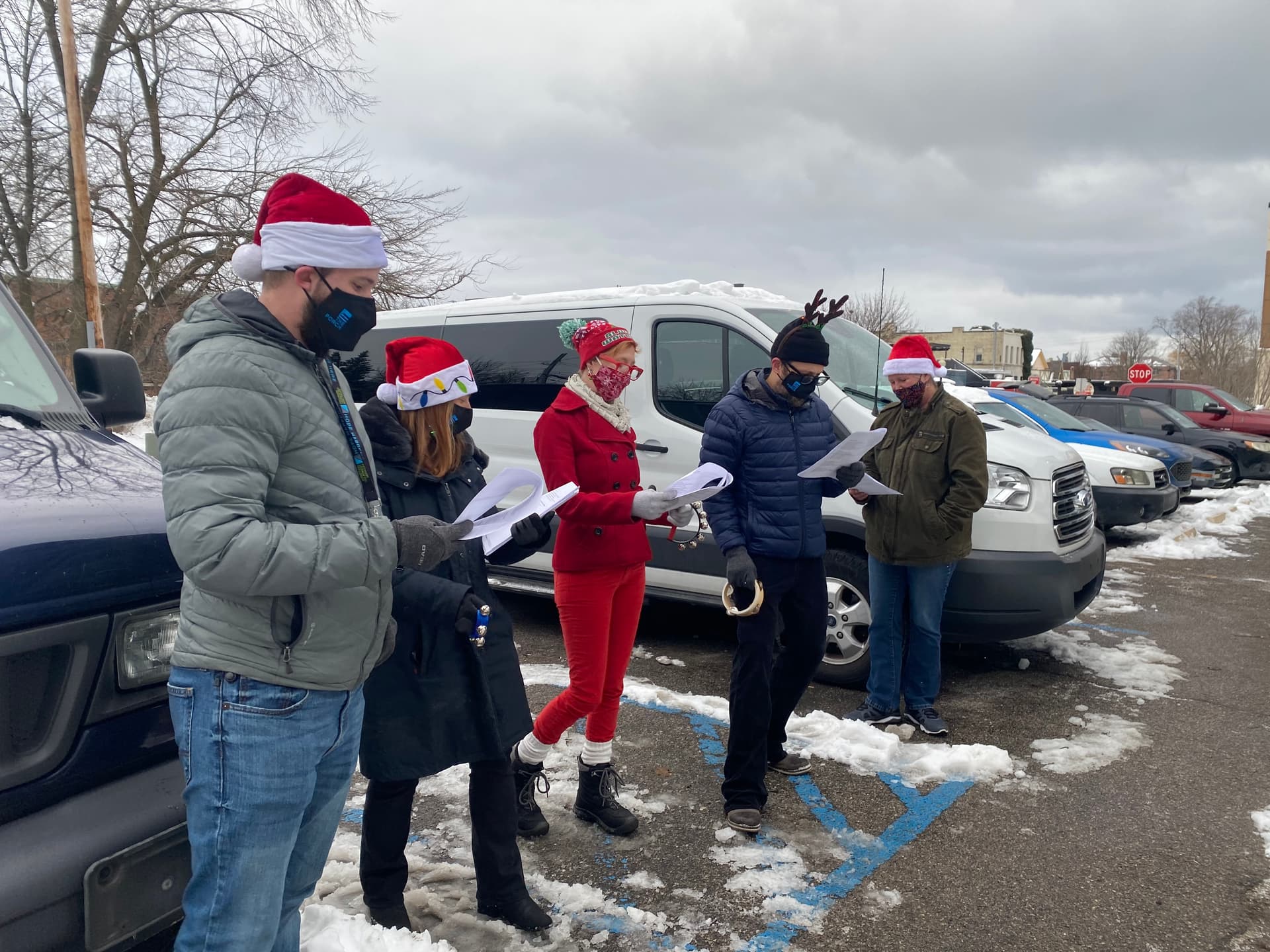 Carolers spread holiday cheer at recovery houses image