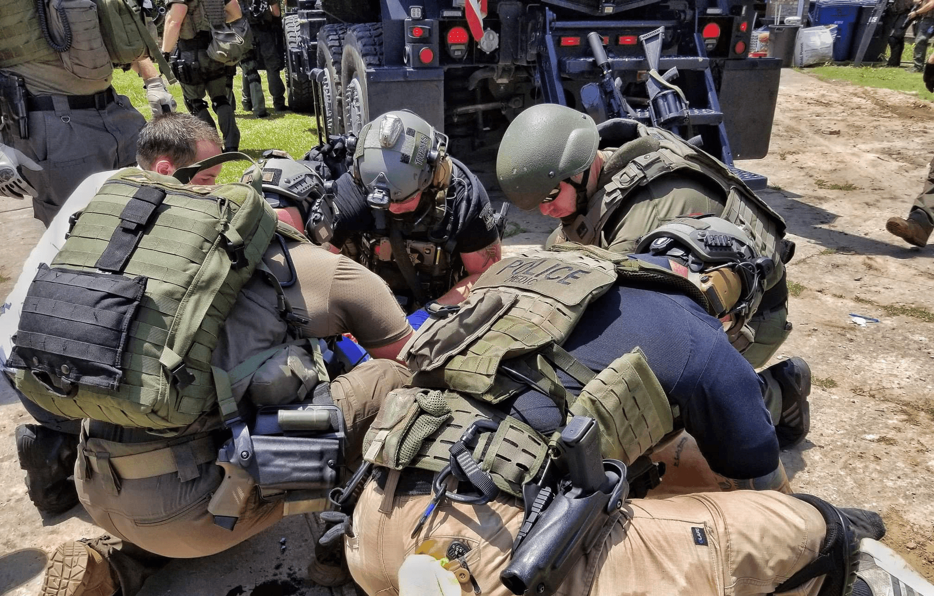 Homicide suspect shot by sniper during brief standoff image