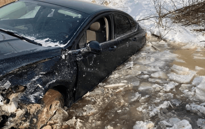Troopers rescue woman from icy creek image