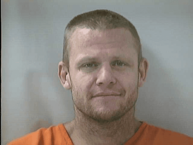 Suspect arrested after body found in arson fire debris  image