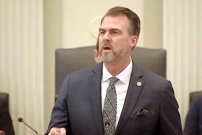 Stitt asks for ‘half and a path’ to eliminate income tax, unveils DOGE image