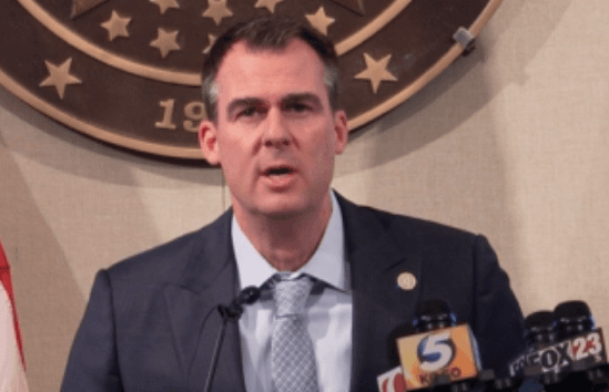 Oklahoma governor says schools can forgo COVID-19 quarantine period image