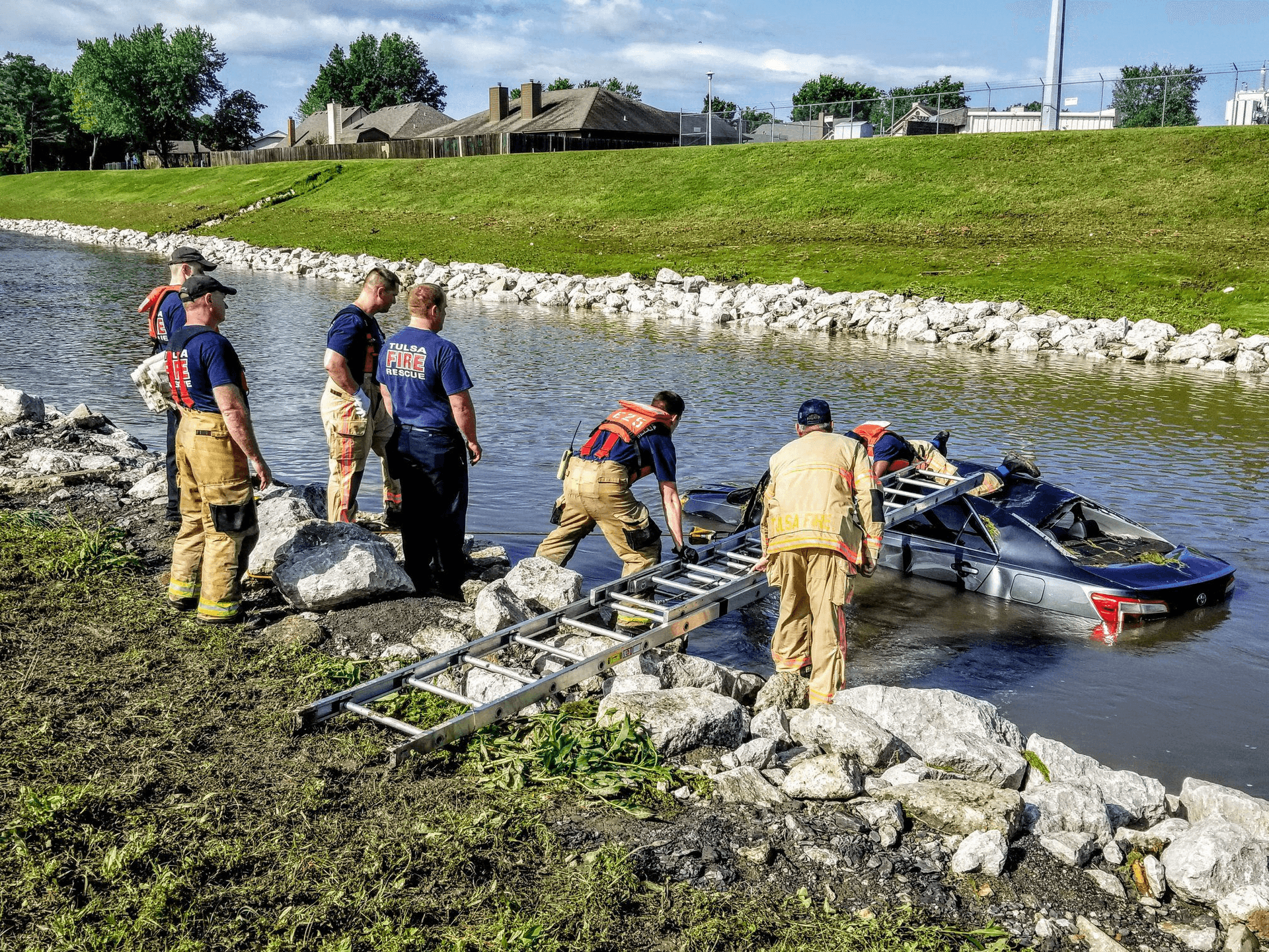 Man killed after car is swept into Tulsa creek image