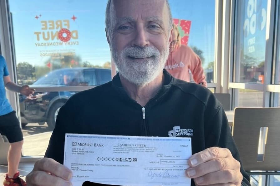 Fired BAPS bus driver gets GoFundMe check image
